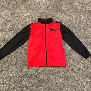 Red/black Pumas fleece.